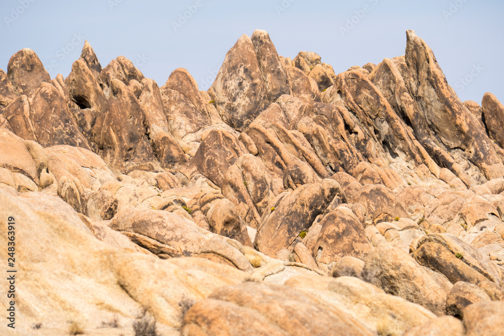 Rocks and boulders in the Alabama Hills Recreation Area near Lone Pine California in the Eastern Sierra Nevada Mountains. Rocks and boulders in the Alabama Hills Recreation Area near Lone Pine California in the Eastern Sierra Nevada Mountains.