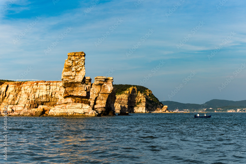 Lijubadao, one of the Changdao Islands, Shandong, China. Seen from the north with the prominent sea stack in the foreground.