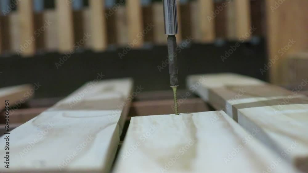 Electric screw driver in action