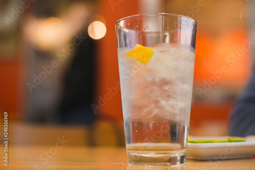 lemon in water glass
