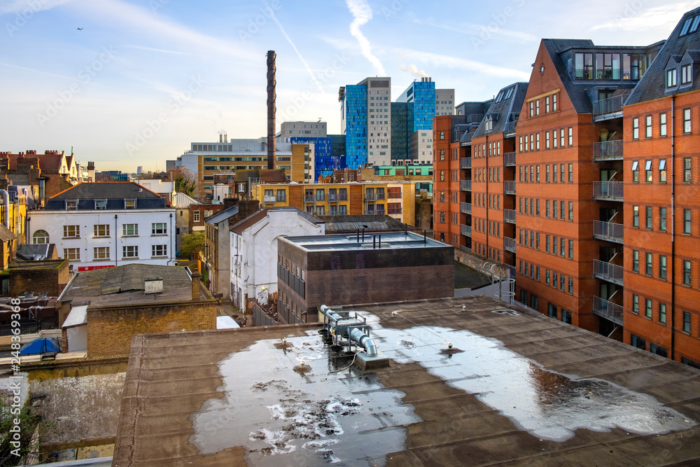 Fototapeta premium London, United Kingdom - Panoramic view of the Whitechapel district of East London with fusion of traditional and modernistic architecture neighboring Whitechapel street