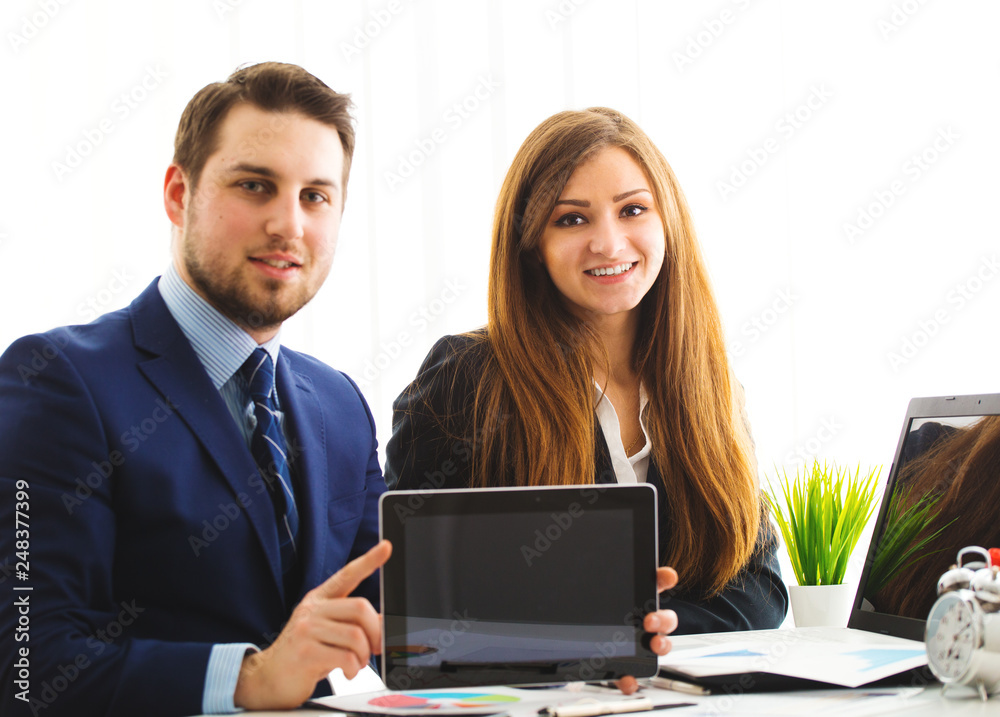 Businessman And Businesswoman Meeting In Modern Office