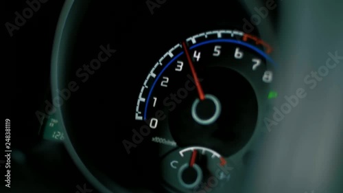 Speedometer and tachometer of a fast-moving car close-up, Race, acceleration, acceleration, speedometer needle. photo