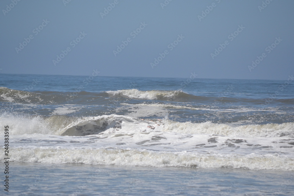 waves breaking on beach