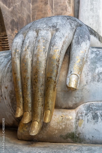 Hand of Buddha Statue in Sukhothai Historical Park in Thailand, The Sukhothai Historical Park ruins are one of Thailand's most impressive World Heritage Sites. 