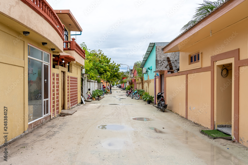 Obraz premium Maafushi, Maldives - November 29, 2018: Street view of Maafushi. Maafushi Island is one of the biggest islands in Maldives.