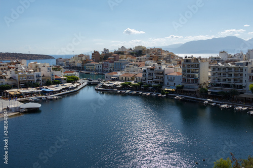 View over a beautiful, picturesque town of Agios Nikolaos, Crete, Grete and small Voulismeni lake and a port. © Marija Krcadinac