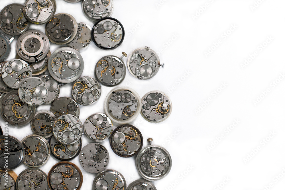 Details of clocks and mechanisms for repair, restoration and maintenance on a white background. Details of clocks and mechanisms for repair, restoration and maintenance on a white background.