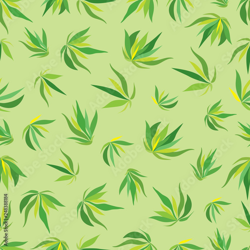 Vector seamless pattern with green leaves on a light green background © Nina