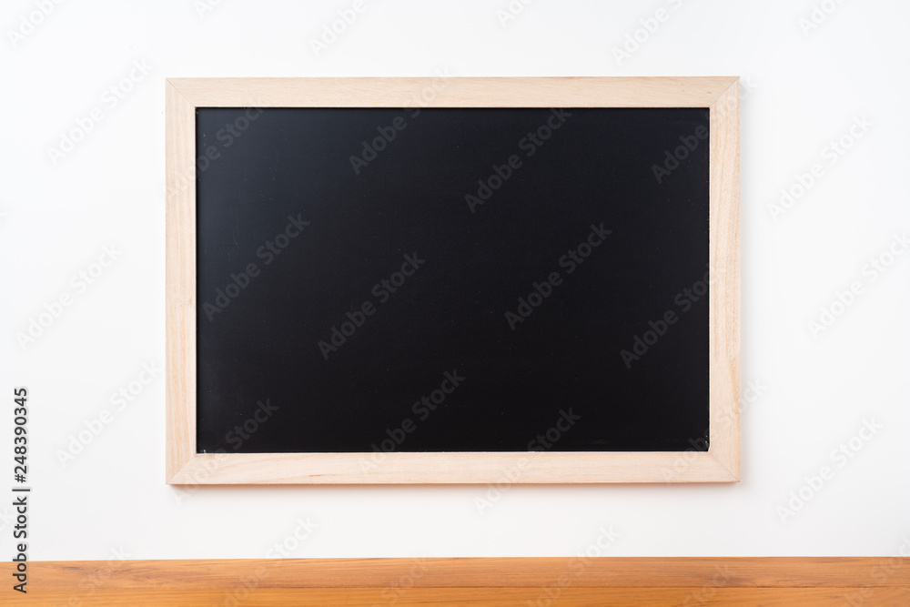 blackboard on white background with teak floor blackboard on white background with teak floor