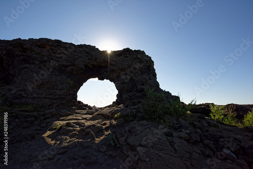 Natural Arch,view of a sunny landscape.Krafla, National Park, Mývatn, Iceland  photo