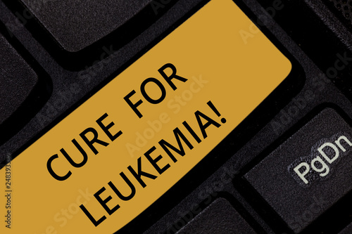 Word writing text Cure For Leukemia. Business concept for transplantation high doses of chemotherapy or radiation Keyboard key Intention to create computer message pressing keypad idea photo