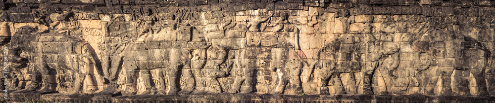 Bas-relief at Terrace of the Elephants . Siem Reap. Cambodia. Panorama