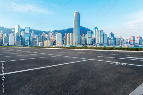 Road and skyline of modern urban architecture in Hong Kong.. © 昊 周