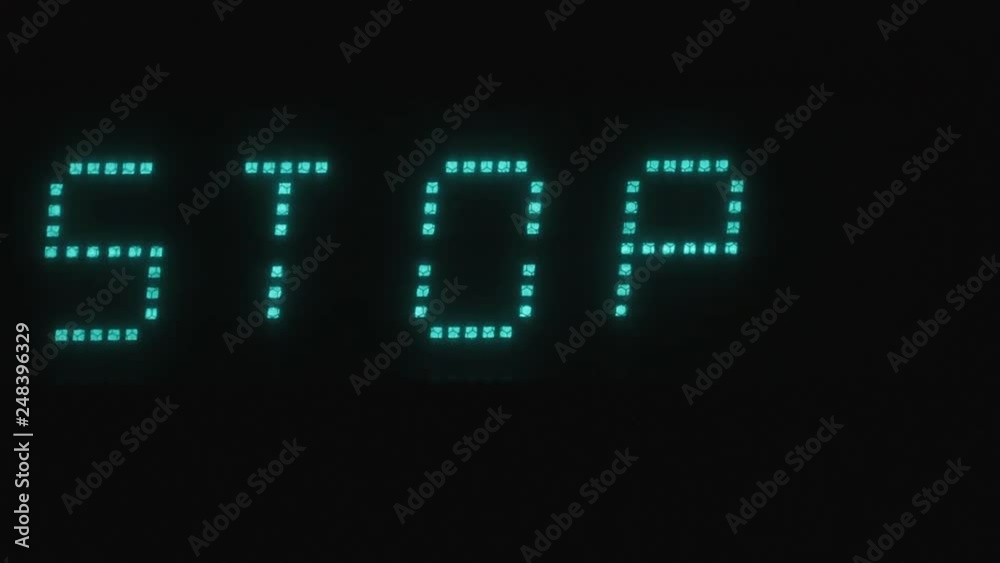 Blinking inscription STOP on the digital screen. Blinking inscription STOP on the digital screen.