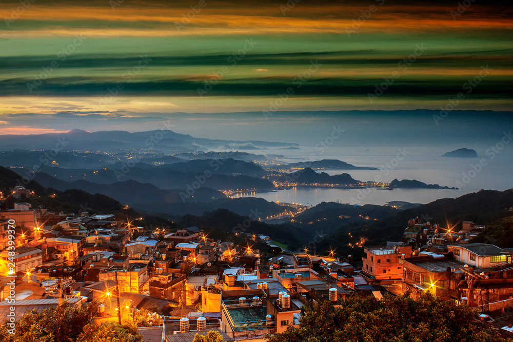 Naklejka premium Night view of Jiufen, People visit heritage Old Town of Jiufen located in Ruifang District of New Taipei City