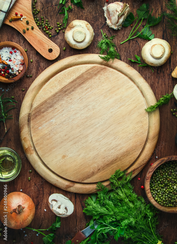 Ingredients for cooking green lentils with mushrooms and vegetables, spices and herbs, vintage wooden kitchen table background, place for text. Vegan or vegetarian food Ingredients for cooking green lentils with mushrooms and vegetables, spices and herbs, vintage wooden kitchen table background, place for text. Vegan or vegetarian food