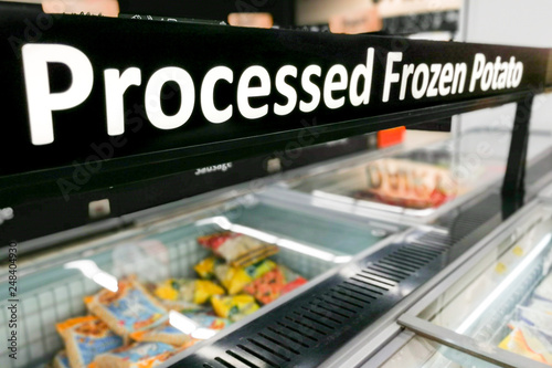 Processed Frozen Potato signage at the fresh refrigerated supermarket