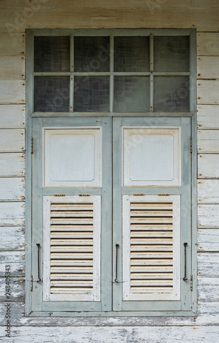 Detailed shoot of window in old house in Thailand. Thai wood house.