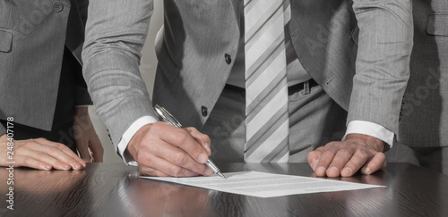 Business people sign up contract
