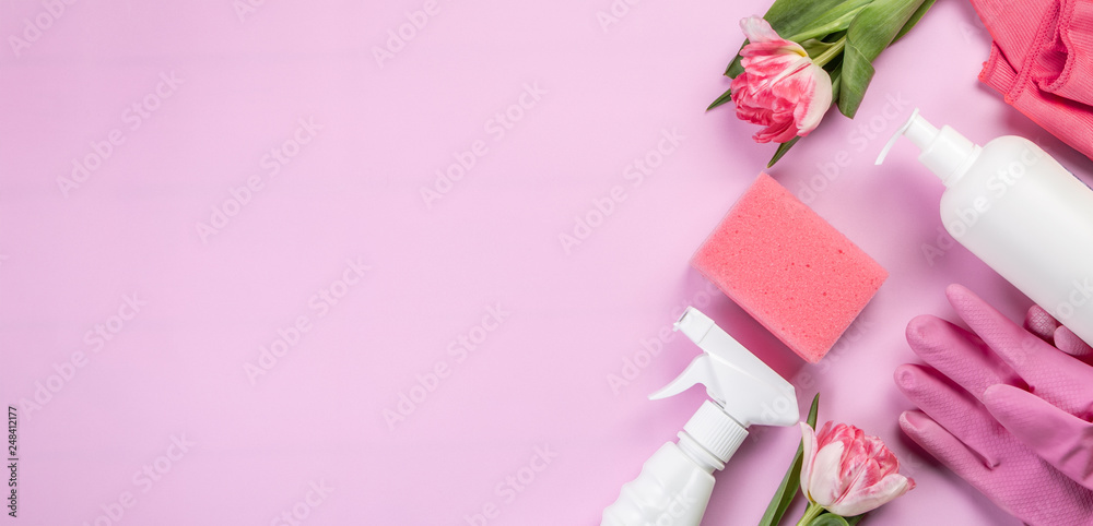 Spring cleaning concept - cleaning products, gloves sponges, top view