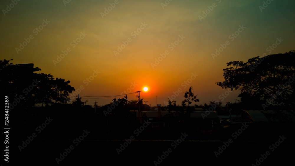The sun is falling near the countryside of Thailand. The sun is falling near the countryside of Thailand.