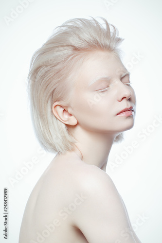 beautiful albino ypung woman on white background photo