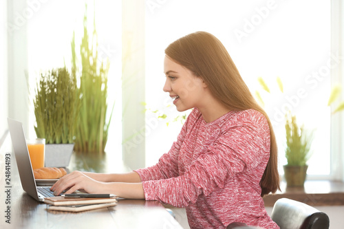 Female freelancer working o...