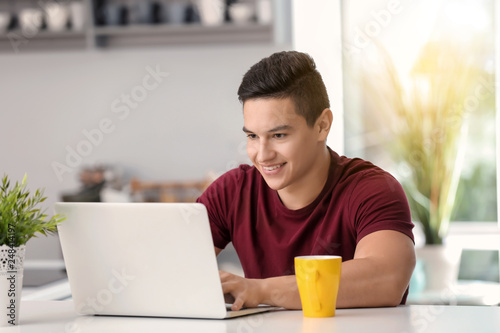 Young freelancer working on...
