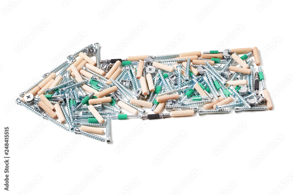Furniture assembly tools in shape of arrow on a white background isolated Furniture assembly tools in shape of arrow on a white background isolated