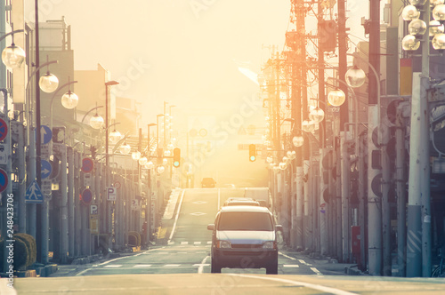 The car and traffic light on the road in kyoto japan on the sunrise screne photo