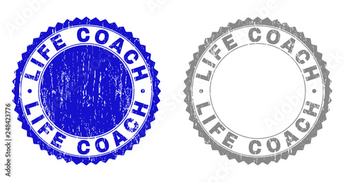 Grunge LIFE COACH stamp seals isolated on a white background. Rosette seals with grunge texture in blue and gray colors. Vector rubber stamp imitation of LIFE COACH title inside round rosette.