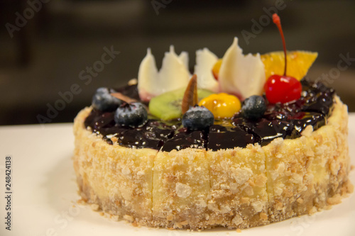 Fototapeta Naklejka Na Ścianę i Meble -   blueberry cheese cake fresh fruit on top