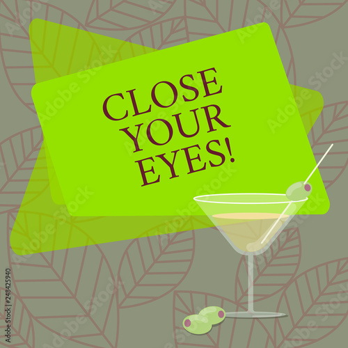 Word writing text Close Your Eyes. Business concept for Cover your sight we have a surprise for you do not peek Filled Cocktail Wine Glass with Olive on the Rim Blank Color Text Space