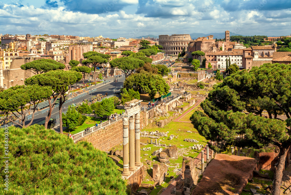 Aerial scenic view of Colosseum and Roman Forum in Rome, Italy. Rome architecture and landmark.