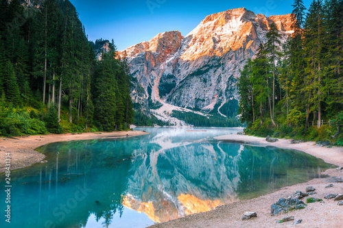 Fototapeta Naklejka Na Ścianę i Meble -  Spectacular misty lake with snowy mountains in Dolomites, Italy, Europe