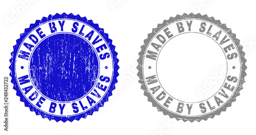 Grunge MADE BY SLAVES stamp seals isolated on a white background. Rosette seals with distress texture in blue and gray colors. Vector rubber stamp imitation of MADE BY SLAVES tag inside round rosette.