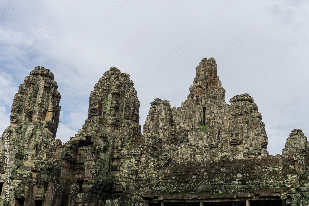 The towers of the Bayon Temple in the early morning light The towers of the Bayon Temple in the early morning light