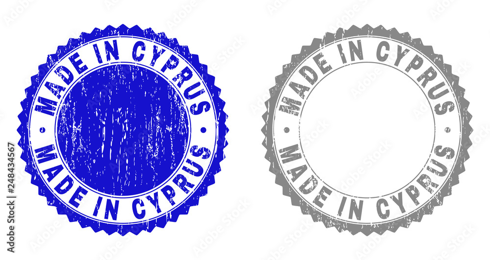 Obraz premium Grunge MADE IN CYPRUS stamp seals isolated on a white background. Rosette seals with grunge texture in blue and grey colors. Vector rubber watermark of MADE IN CYPRUS title inside round rosette.