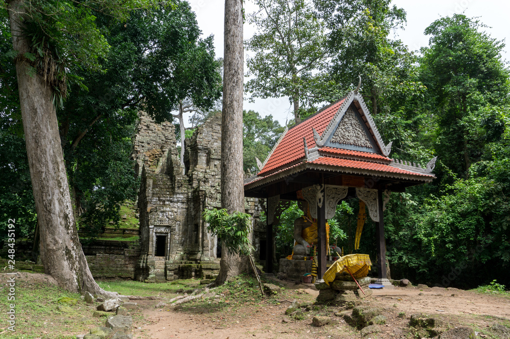 Buddhist shrine inside the Angkor Wat temple complex near the town of Siem Reap in Cambodia Buddhist shrine inside the Angkor Wat temple complex near the town of Siem Reap in Cambodia