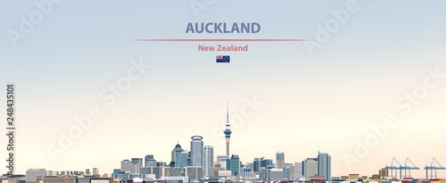 Vector illustration of Auckland city skyline on colorful gradient beautiful day sky background with flag of New Zealand