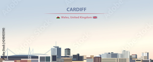 Cardiff city skyline vector illustration on colorful gradient beautiful day sky background with flags of Wales and United kingdom