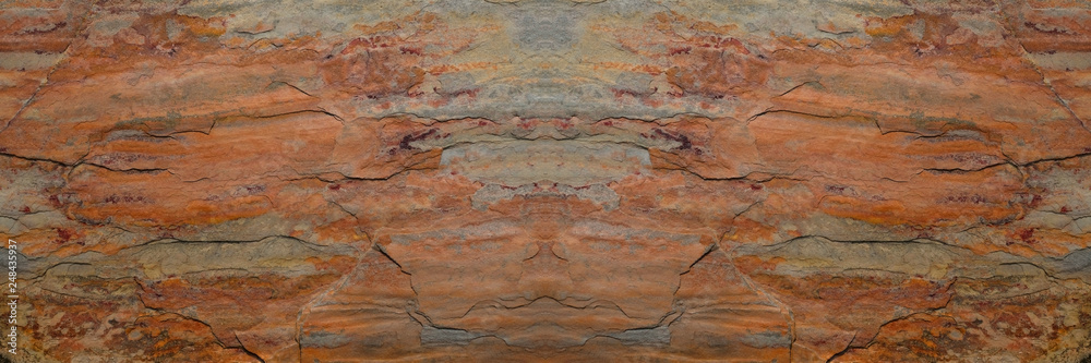 Rust stone wall in panorama view or grunge stone texture image use for stone background