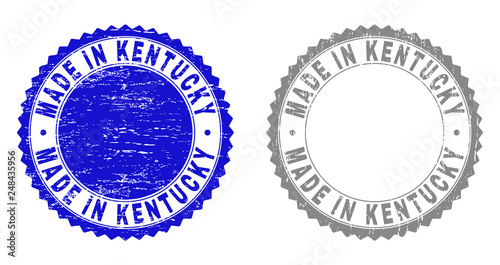 Grunge MADE IN KENTUCKY stamp seals isolated on a white background. Rosette seals with grunge texture in blue and gray colors. Vector rubber overlay of MADE IN KENTUCKY label inside round rosette.