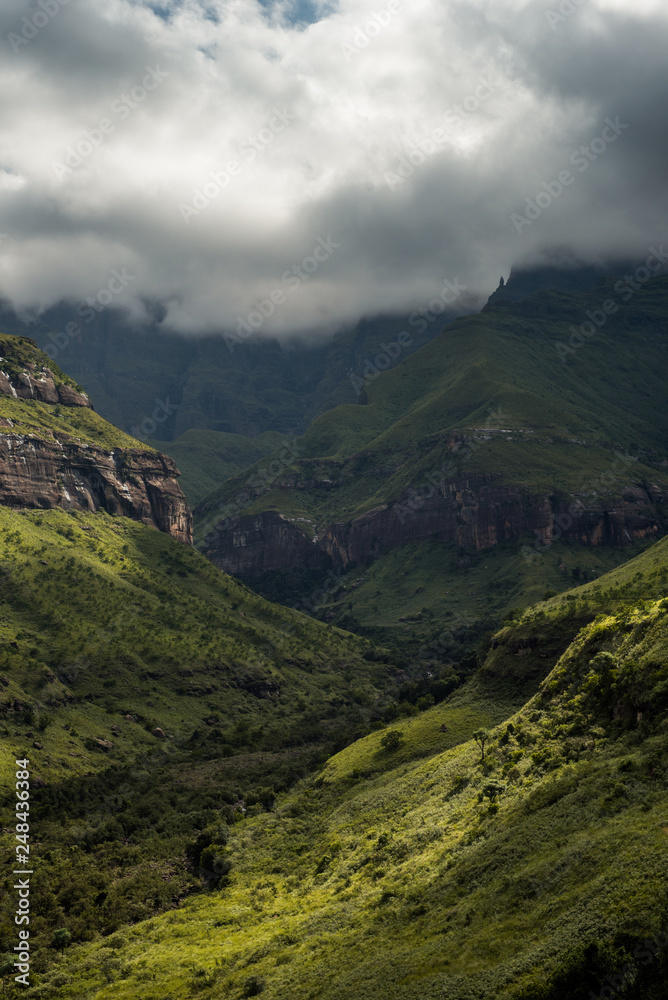 Ciffs and mountain sides on the Tugela Falls hike on the Amphitheatre mountain in the Royal Natal National Park, Drakensberg, South Africa