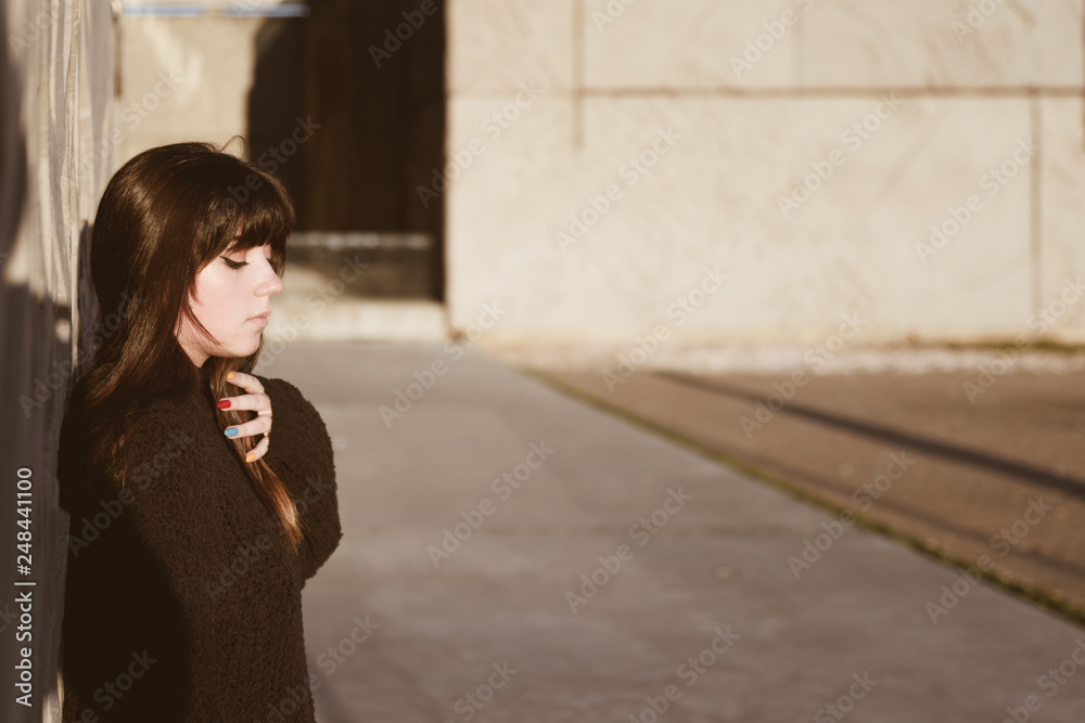 girl young hipster millennial with hair color against gray wall with space for text girl young hipster millennial with hair color against gray wall with space for text