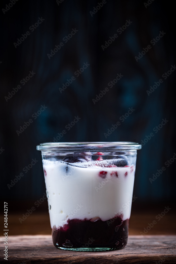 Natural yoghurt and raspberry dessert with granola Natural yoghurt and raspberry dessert with granola