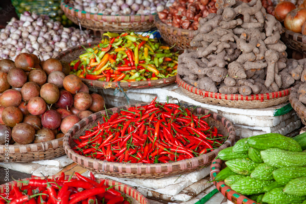 tropical spices and fruits sold at a local market in Hanoi (Vietnam)