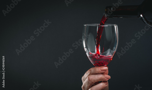 red wine pouring glass