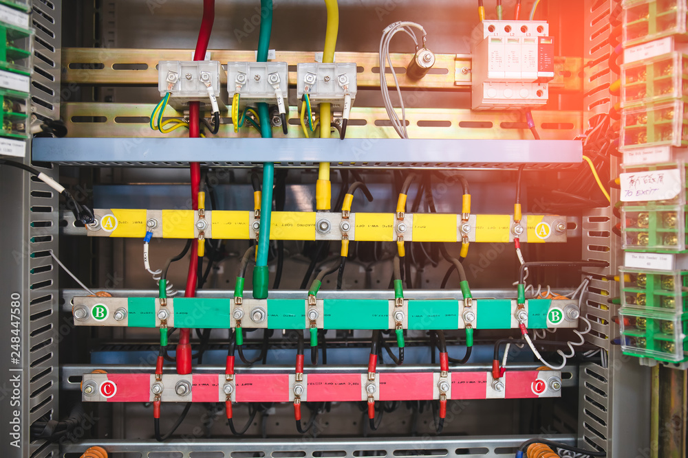 Foto Stock Electric circuit breakers in a electrical switchboard